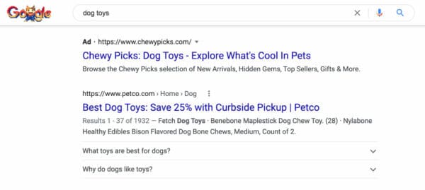 SEO vs PPC: example of organic and paid result in Google
